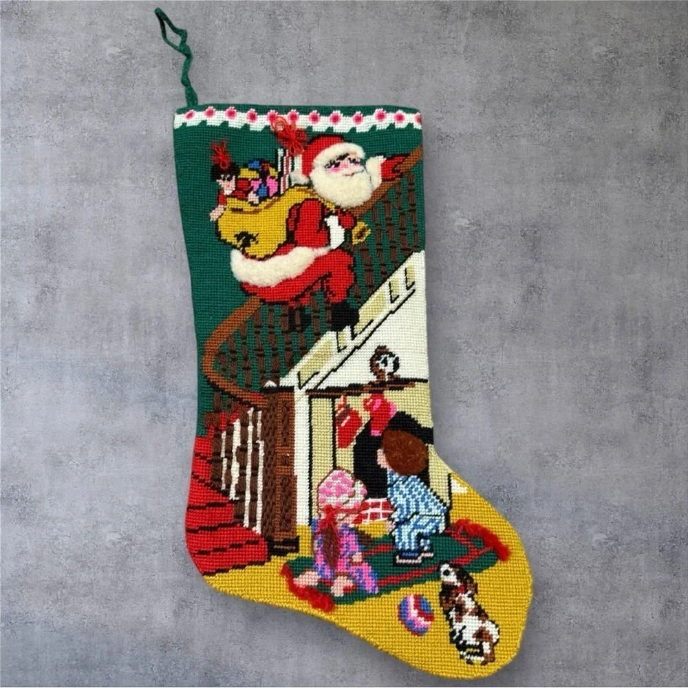 Vintage needlepoint Christmas stocking featuring design “Down The Bannister